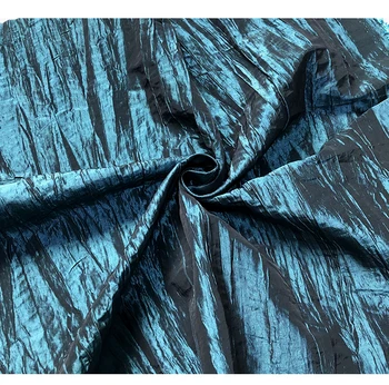 Modes kroku ieliektas konstrukcijas safīra zils spīdums nelegālo kroku auduma pusē, svārki auduma vējjaka